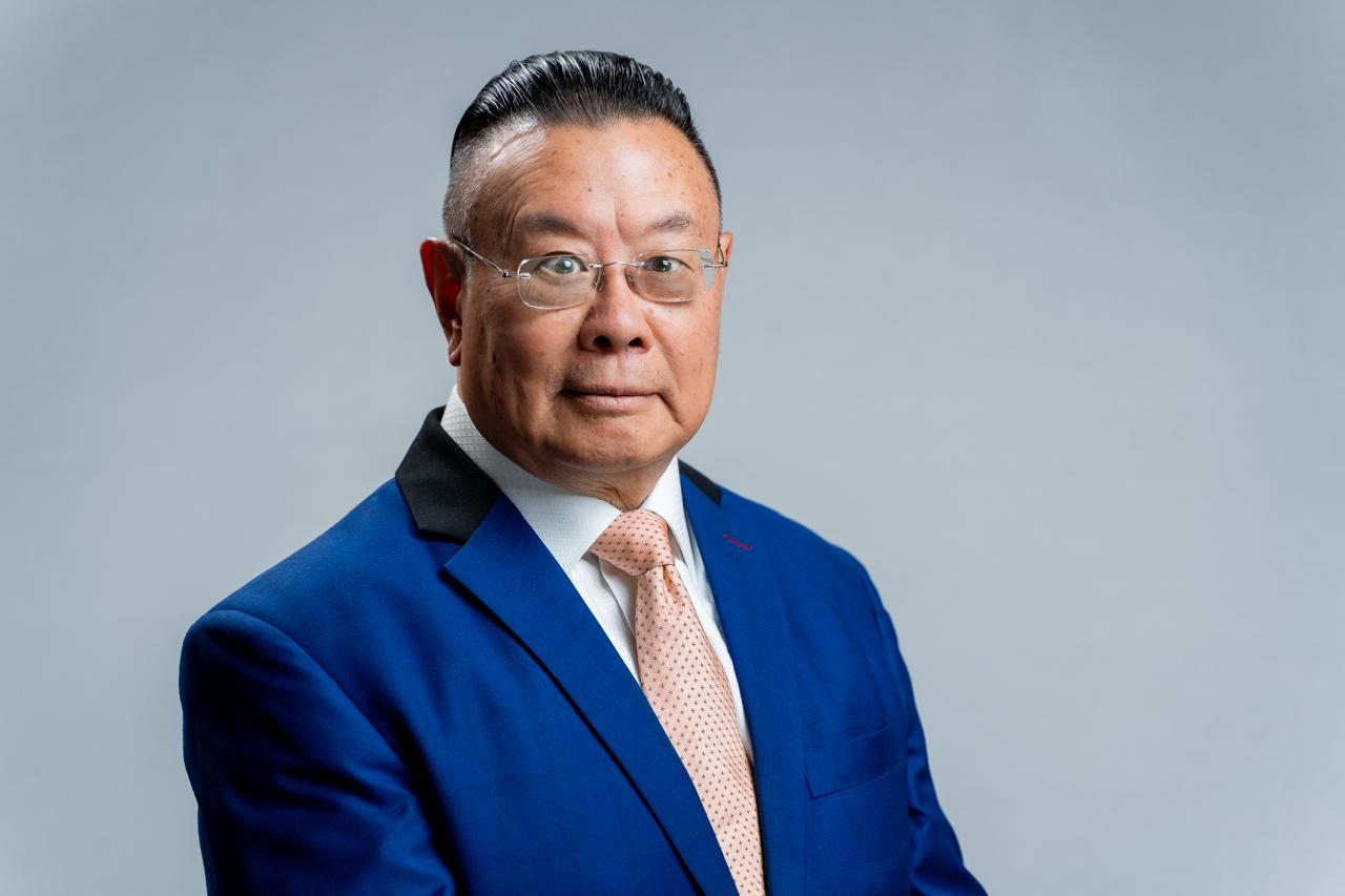 Ernie Lai King - Chairman